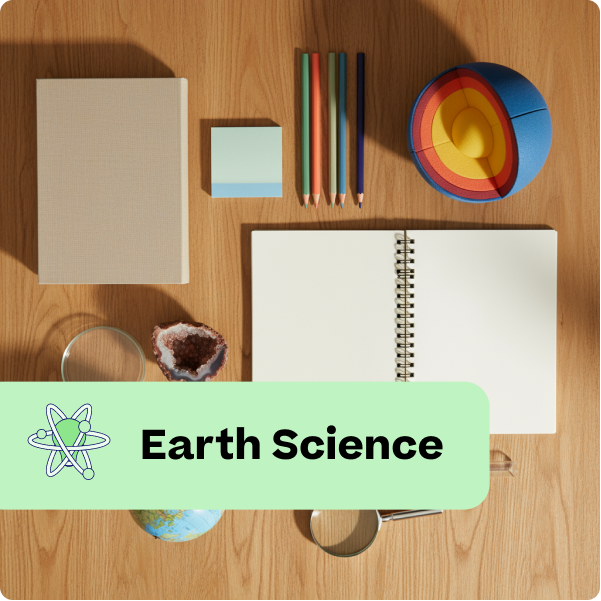 Educational setup with notebook, pens, and globe on a wooden surface, labeled 'Earth Science'.