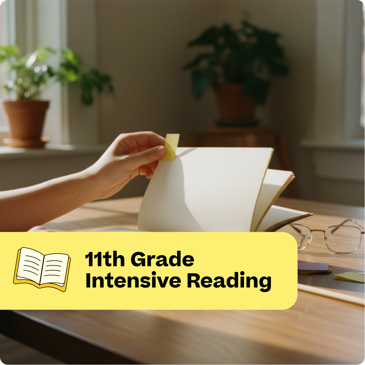 Person reading a book with a yellow label indicating '11th Grade Intensive Reading' on a desk.