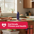 Person eating at a kitchen table with a purple water bottle and jump rope, labeled '2nd Grade Fitness and Health'.