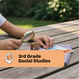 Child using a magnifying glass on a wooden table with educational materials, labeled '3rd Grade Social Studies'.
