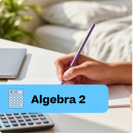 Hand holding a pen with 'Algebra 2' text and calculator on a desk.