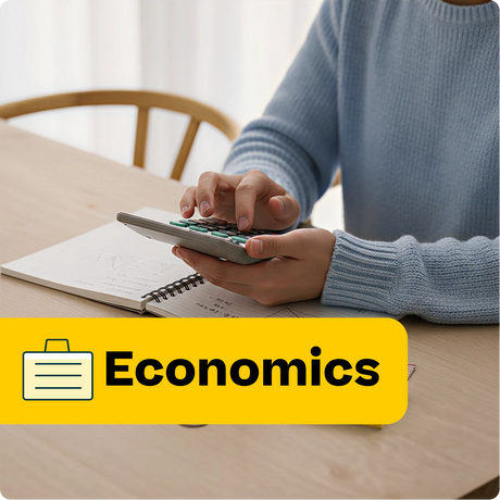 Person using a calculator with an economics label on a table