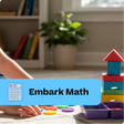 Child playing with colorful math toys on a carpeted floor, with 'Embark Math' branding.