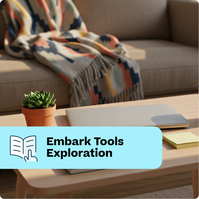 Living room with a couch, coffee table, and decorative elements, featuring 'Embark Tools Exploration' text.