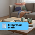 Living room with a coffee table featuring educational items and a 'Integrated Math' label.